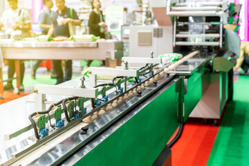 close up goods or product during pass inspection process of high performance detect sensor on continue mass production line for industry commercial