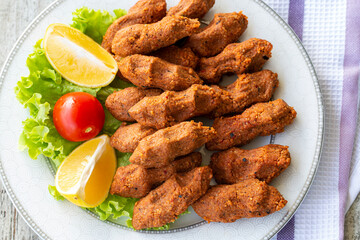 Newly built raw meatballs, turkey specific food, cig kofte, close-up,