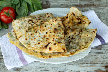 Turkish delicious foods; spinach patty (D borek, gozleme)