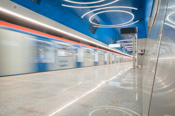 Moving subway train on the station