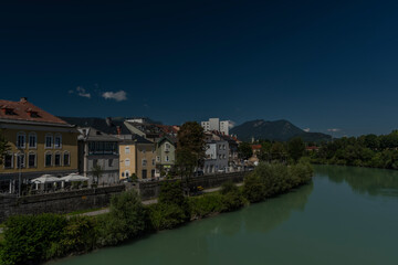 River Drau in Villach town in south Austria in hot summer sunny morning