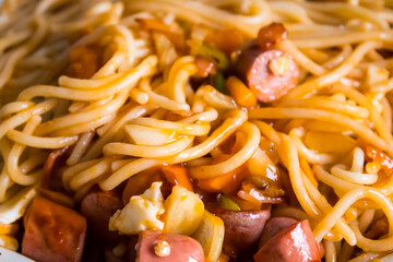 Pasta plate with assorted vegetables and sausages