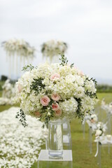 Wedding arch, chairs for guests, wedding accessories and decorations. Wedding ceremony. Beautiful wedding setup.
