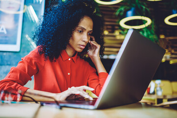 African american female calling to customer service for consultancy about notification for laptop...