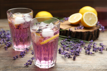 Fresh delicious lemonade with lavender on wooden table