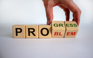 Solving a problem and making progress. Hand flips a cubes and changes the word 'problem' to...