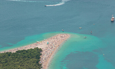 Zoomed in view from Vidova gora mountain of the famous golden Zlatni rat beach on the island of...