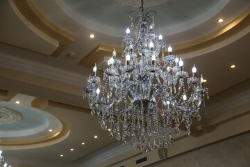 beautiful shiny chandelier hanging from the ceiling