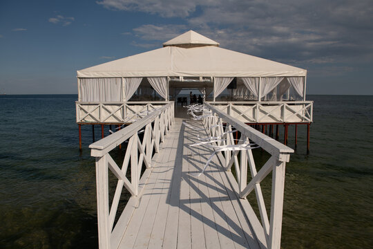 pier with a hut jn the sea