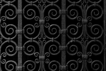Wrought iron bars. Black iron texture and background.