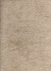 Terry towel. Brownish background like fabric. Fabric texture like carpet