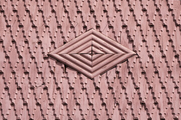 Colorful traditional facade house with painted wooden decorative elements in Maramures, Romania