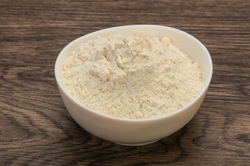 Wheat flour heap in the bowl