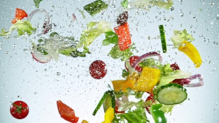 Super Slow Motion Shot of Flying Fresh Vegetables. Shot with high speed cinematic camera, super slow motion at 1000 fps. - Powered by Adobe