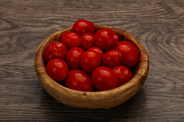 Pickled cherry tomatoes in the bowl
