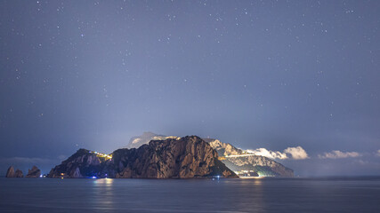 night view of the island of capri with stars taken from Massa Lubrense © AShots