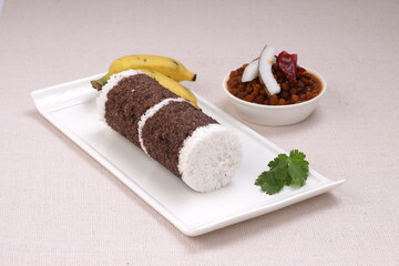 Ragi Puttu or Finger Millet  steamed cake with bengal gram curry