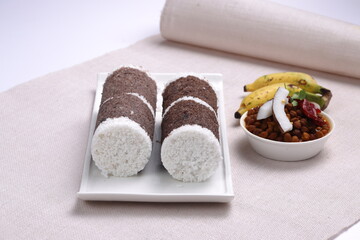 Ragi Puttu or Finger Millet  steamed cake with bengal gram curry