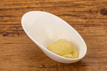 Dijon mustard sauce in the bowl