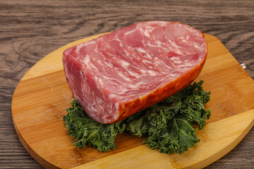 Beef ham piece over board