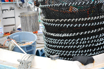 Fishing nets and gear on a boat.