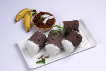 Ragi Puttu or Finger Millet  steamed cake with bengal gram curry