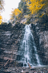 Obraz na płótnie Canvas autumn forest waterfall landscape view