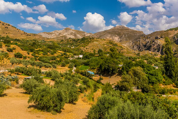 A view from the outskirts of Monachil towards the Sierra Nevada mountains, Spain in the summertime