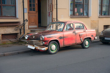 Saint Petersburg, Russia - July 24, 2020 - Old passenger car on the street of the Russian city