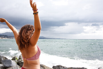 Young woman enjoying a day at the beach