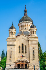 Fototapeta premium The orthodox cathedral in Cluj Napoca, Transylvania, Romania. Cathedral of the Dormition of the Theotokos or Dormition of the Mother of God built in Brancovenesc style on the Avram Iancu Square