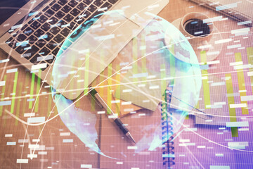 Business theme hologram drawings over computer on the desktop background. Top view. Multi exposure. Concept of international connections.