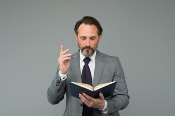 reading law book. man found what he was looking for. businessman read book about success. Handsome...