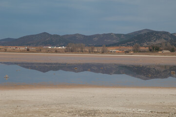 Mountains reflected in a lagoon. Gallocanta Lagoon Natural Reserve. Aragon. Spain.