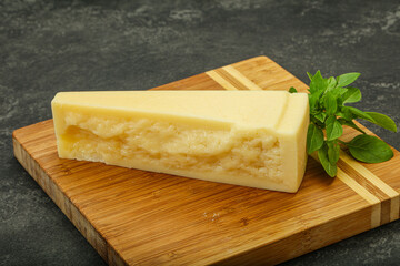 Hard parmesan cheese served basil