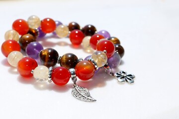 bracelets made of amethyst, tiger's eye, citrine and sardonyx