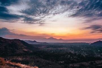 Fototapeta na wymiar Sunset with mountains