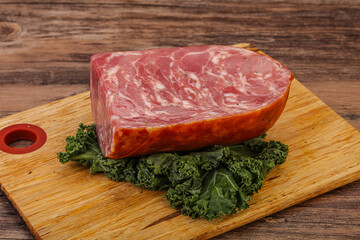 Beef ham piece over board