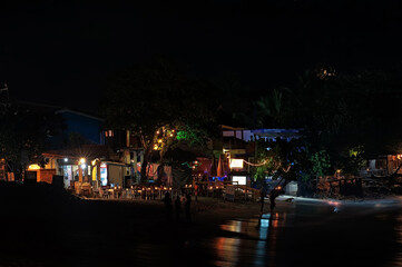 Fototapeta na wymiar Night life scene on Unawatuna Beach in Sri Lanka