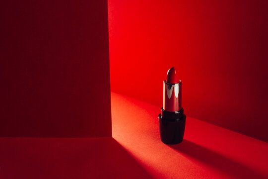 Download Red Lipstick In Elegant Shiny Tubes Placed On Red Background Buy This Stock Photo And Explore Similar Images At Adobe Stock Adobe Stock PSD Mockup Templates