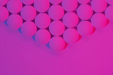 Geometrc pattern of round medical pills on pink background