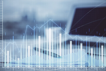 Double exposure of financial graph drawings and desk with open notebook background. Concept of forex market