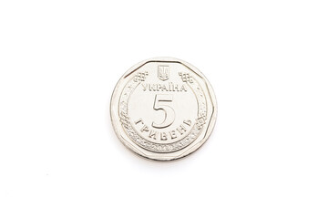 5 hryvnia coin close-up on a white isolated background. Ukrainian coins