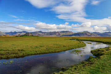 landscape with stream and mountains