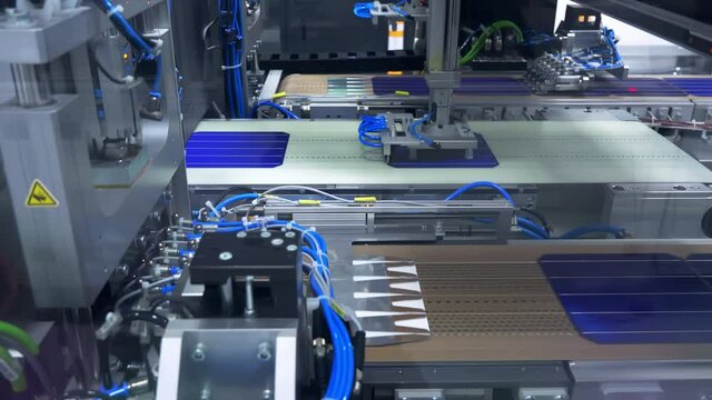 High-Speed Robotic Solar Cell Stringing and Infrared Soldering Process Connecting Silicon Photovoltaic Cells on Automated PV Module Production Line