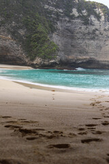 Manta Bay or Kelingking Beach on Nusa Penida Island, Bali, Indonesia. Amazing  view, white sand beach with rocky mountains and azure lagoon with clear water of Indian Ocean 