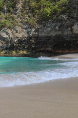 Manta Bay or Kelingking Beach on Nusa Penida Island, Bali, Indonesia. Amazing  view, white sand beach with rocky mountains and azure lagoon with clear water of Indian Ocean 