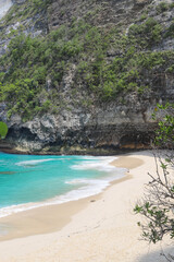 Manta Bay or Kelingking Beach on Nusa Penida Island, Bali, Indonesia. Amazing  view, white sand beach with rocky mountains and azure lagoon with clear water of Indian Ocean 