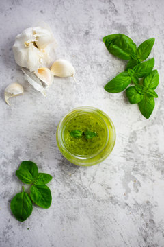 Pesto, garlic and basil leaves