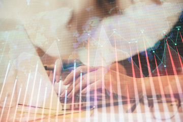 Multi exposure of woman hands typing on computer and financial graph hologram drawing. Stock market analysis concept.